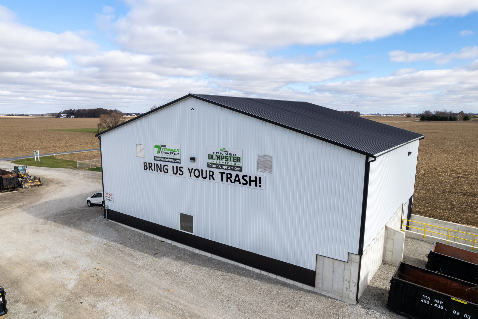 Tonner Transfer Station building with 'Bring Us Your Trash' signage