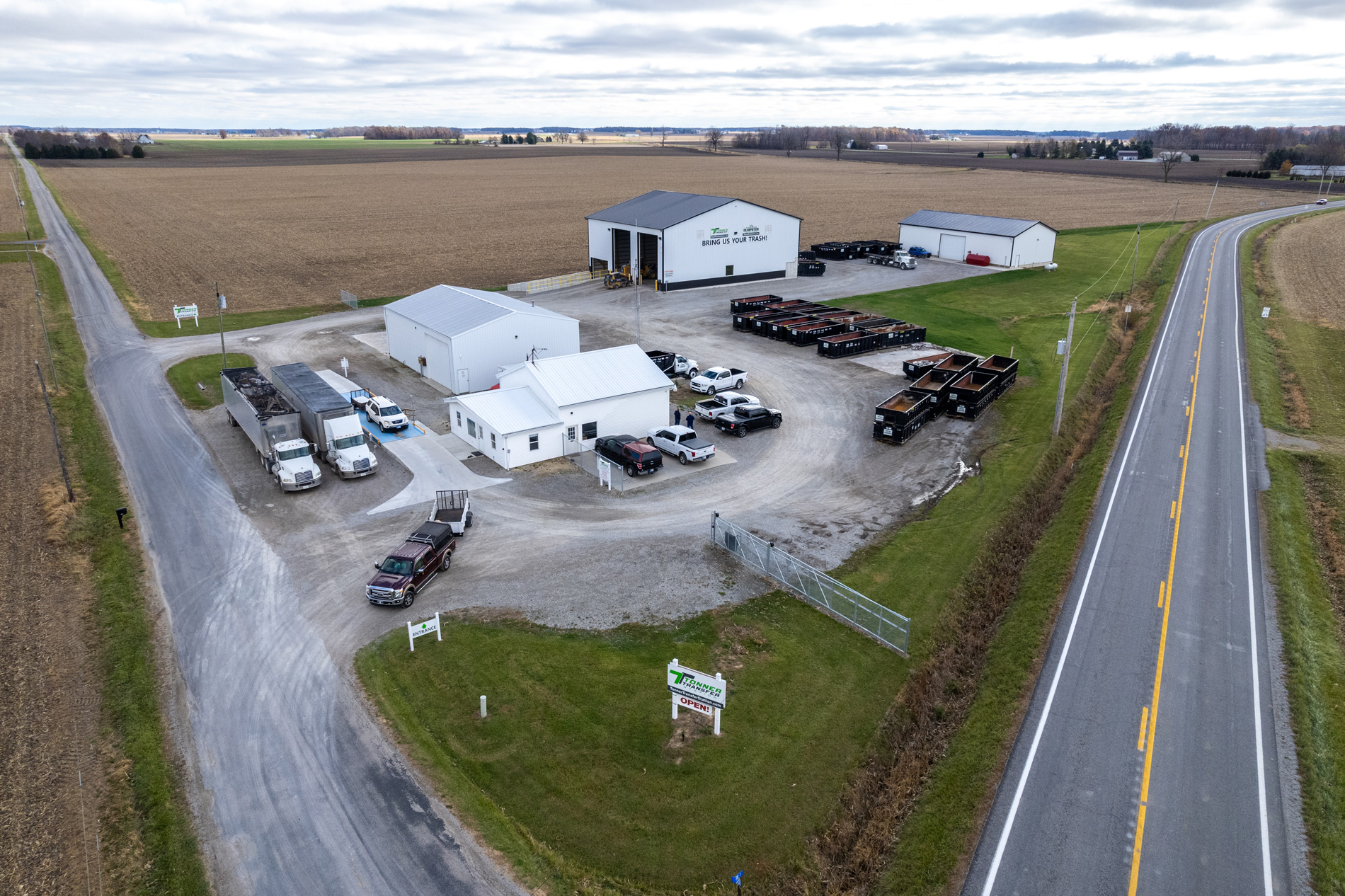 Aerial view of the Tonner facility in Bluffton, Indiana, showing the transfer station building, dumpster yard, and trucks